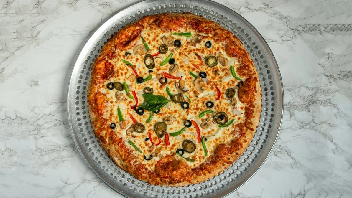 Golden samosas and poutine sides at Jambo Pizza 818 Sargent Ave Winnipeg